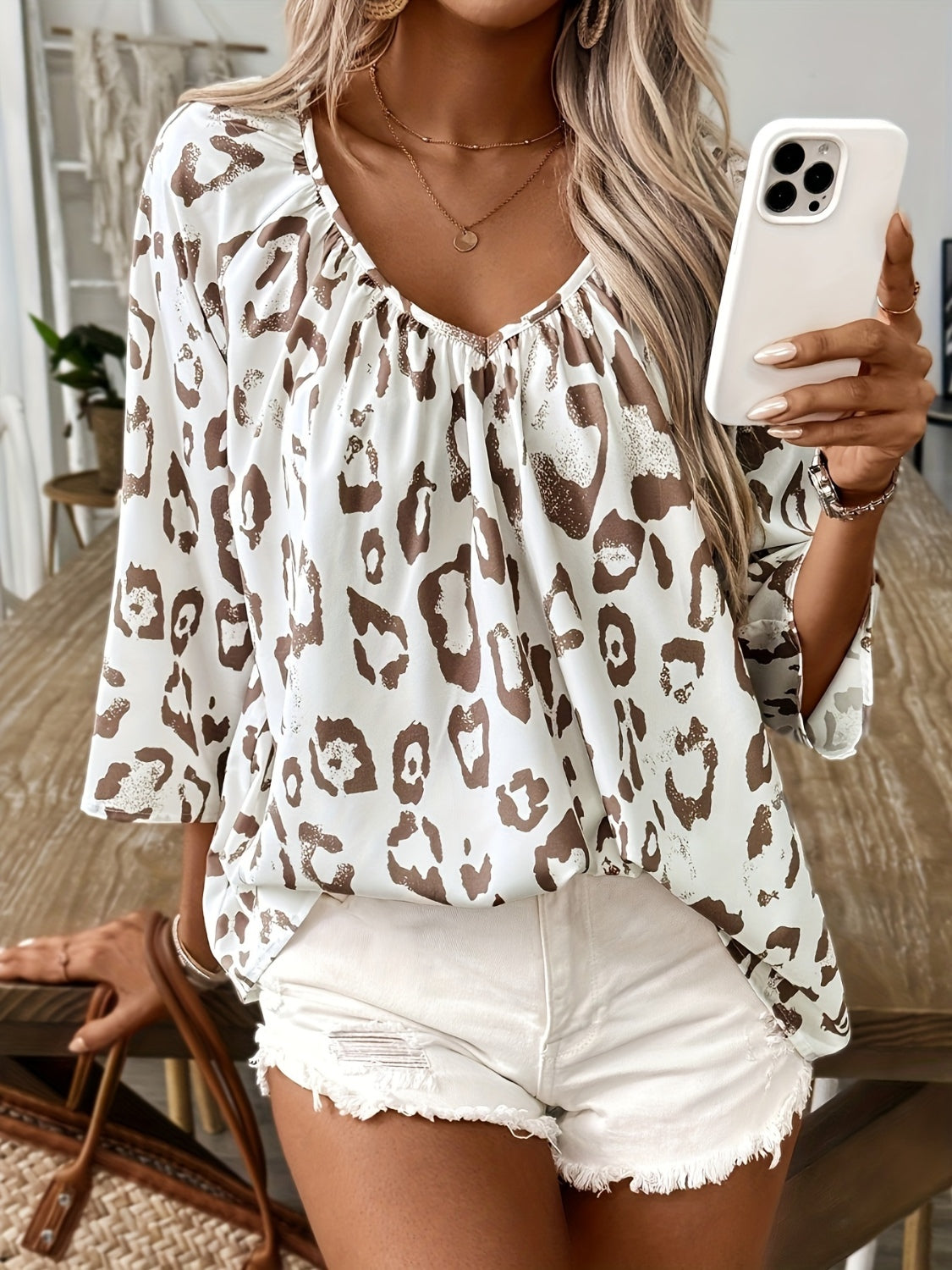 Ruched Leopard V-Neck Blouse in action – The perfect Tops for any season.