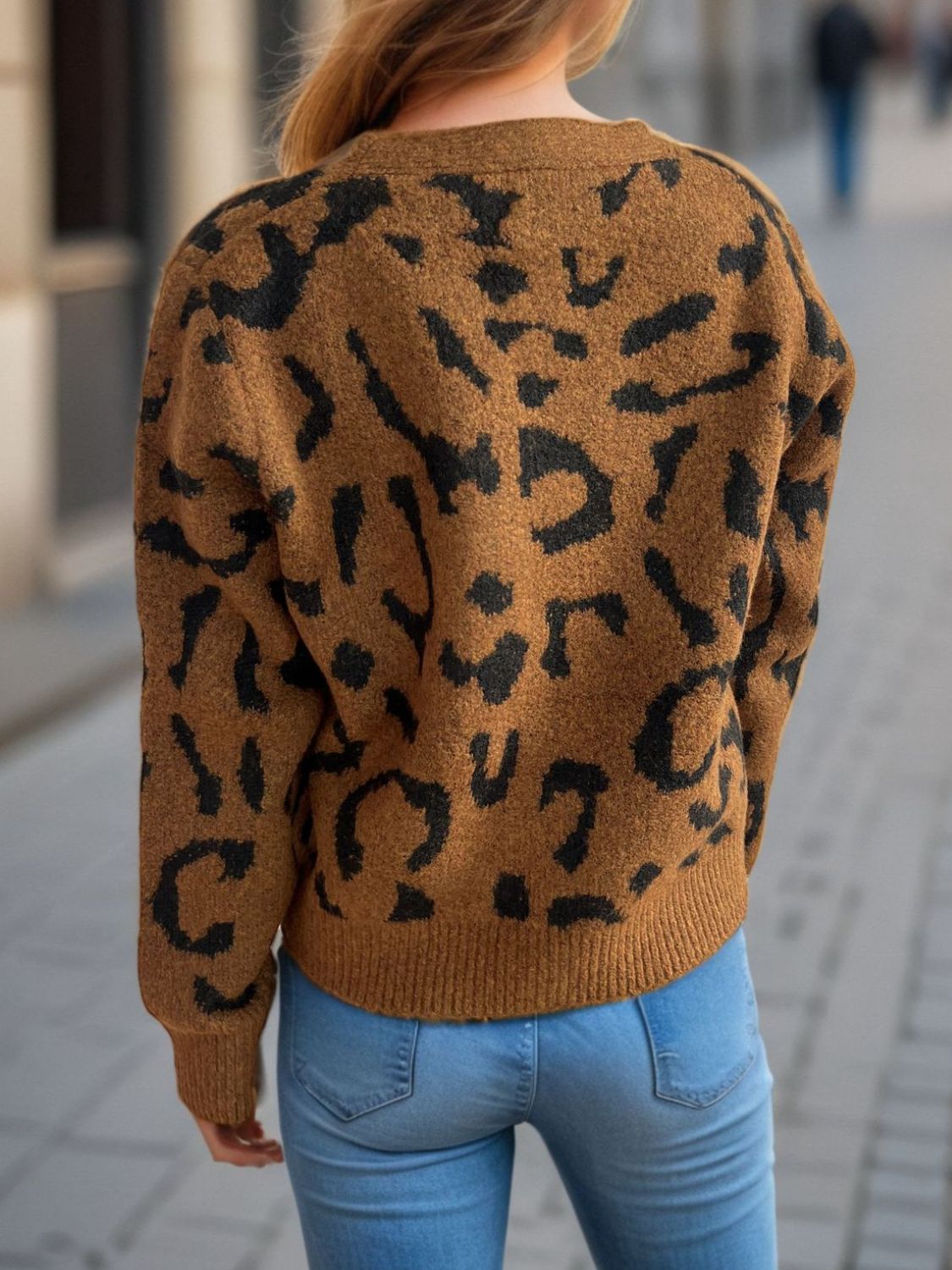 Modern and sleek, the Leopard V-Neck Button Up Cardigan enhances any wardrobe effortlessly.