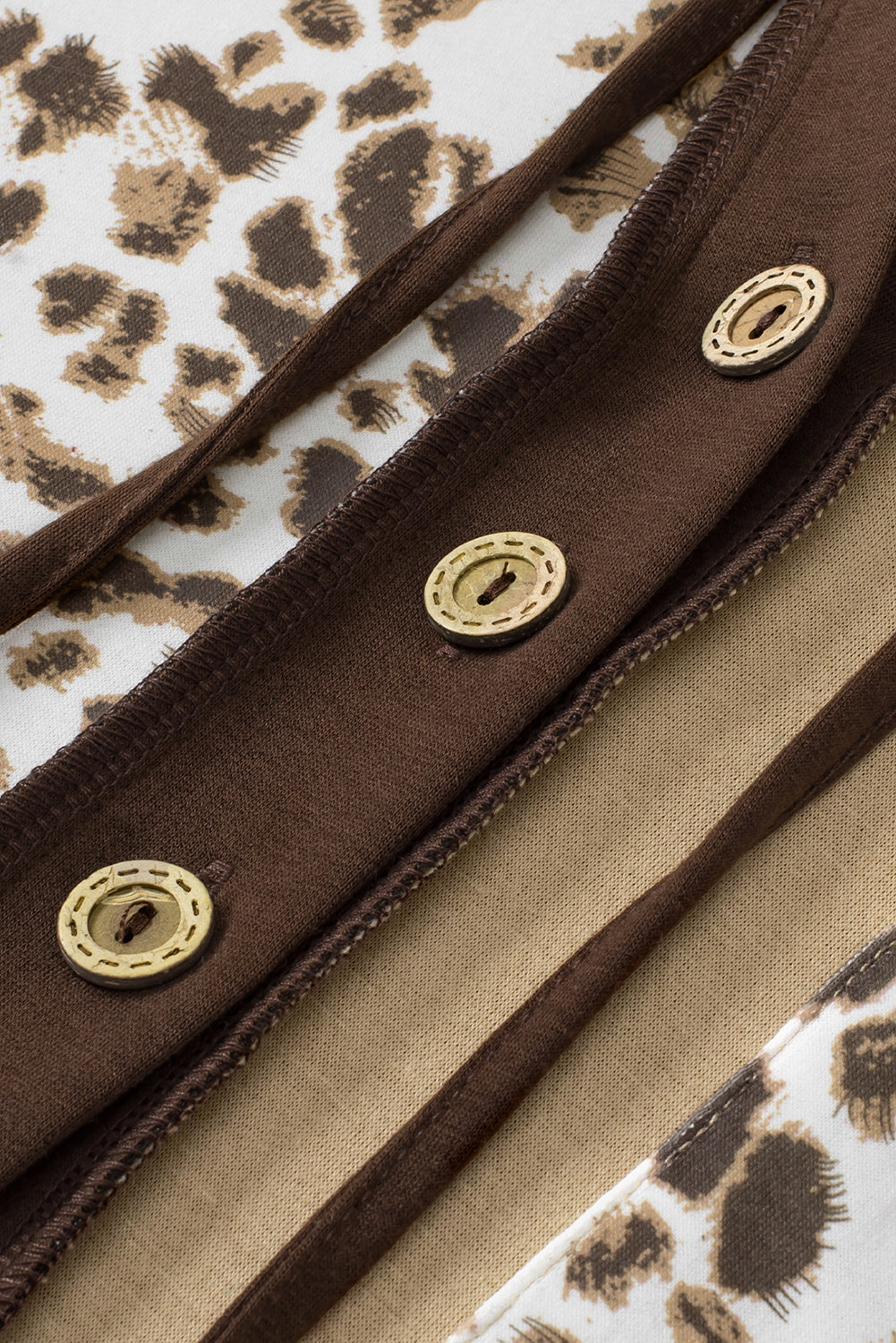 Detailed view of Leopard Drawstring Chest Pocket Hoodie, highlighting its stylish cut and fit.