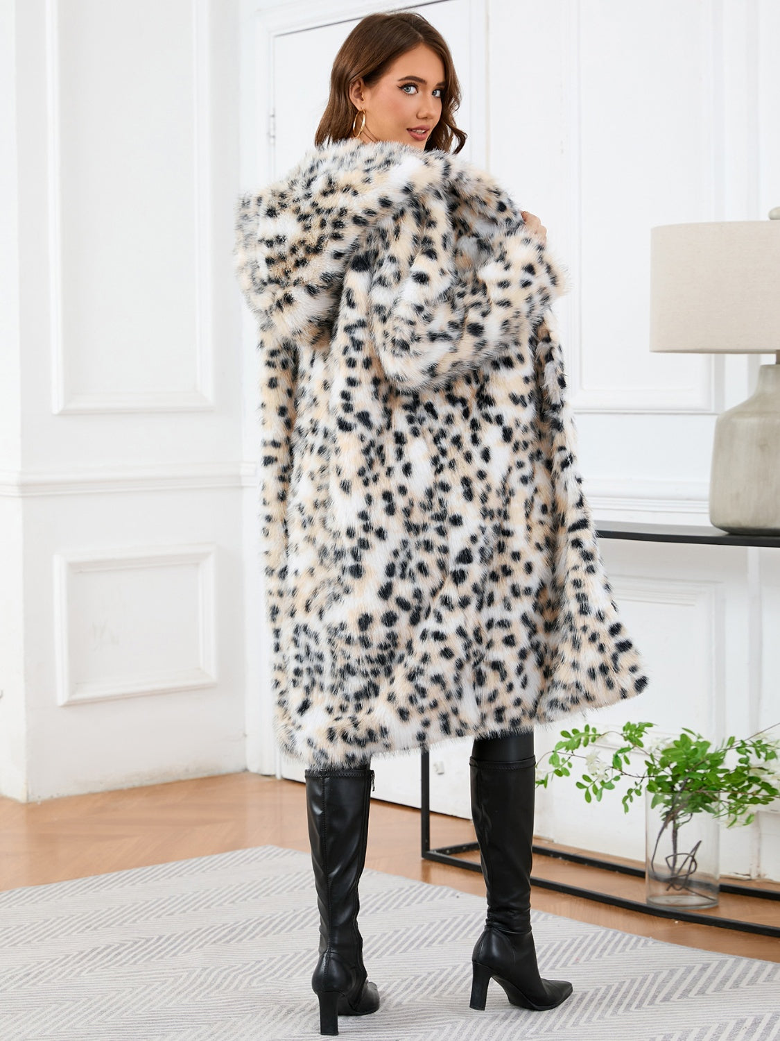 Luxury meets fashion in the Thermal Leopard Faux Fur Hooded Outerwear – A must-have Outerwear.