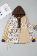 Detailed view of Leopard Drawstring Chest Pocket Hoodie, highlighting its stylish cut and fit.