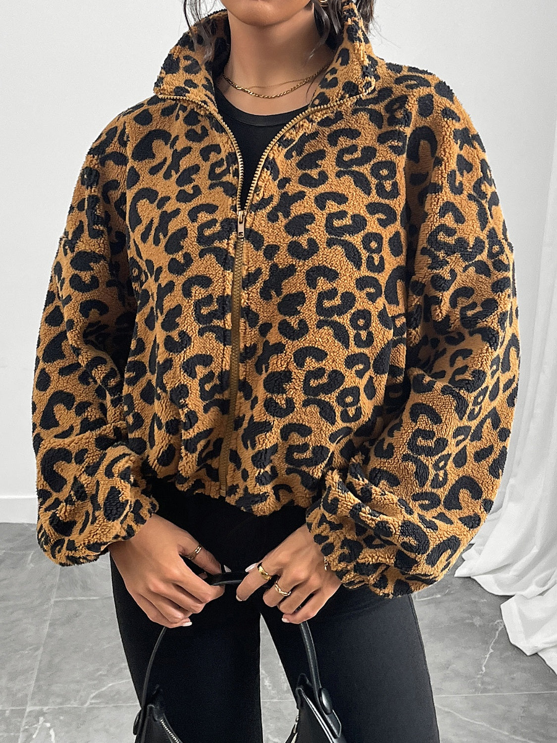 Close-up of Leopard Zip Up Long Sleeve Jacket, showcasing high-quality fabric and design.