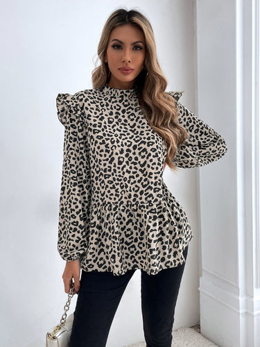 Modern and sleek, the Ruffled Leopard Mock Neck Long Sleeve Blouse enhances any wardrobe effortlessly.