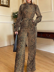 Luxury meets fashion in the Leopard Flounce Sleeve Wide Leg Jumpsuit – A must-have Jumpsuit.