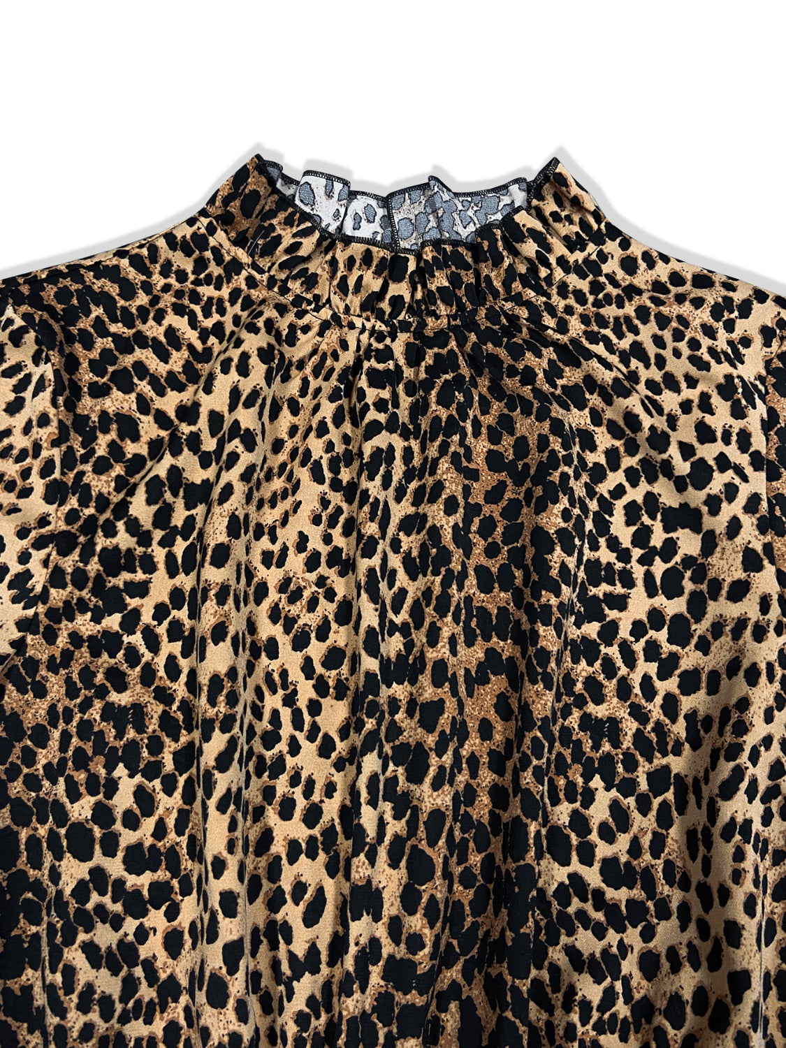 Luxury meets fashion in the Leopard Flounce Sleeve Wide Leg Jumpsuit – A must-have Jumpsuit.