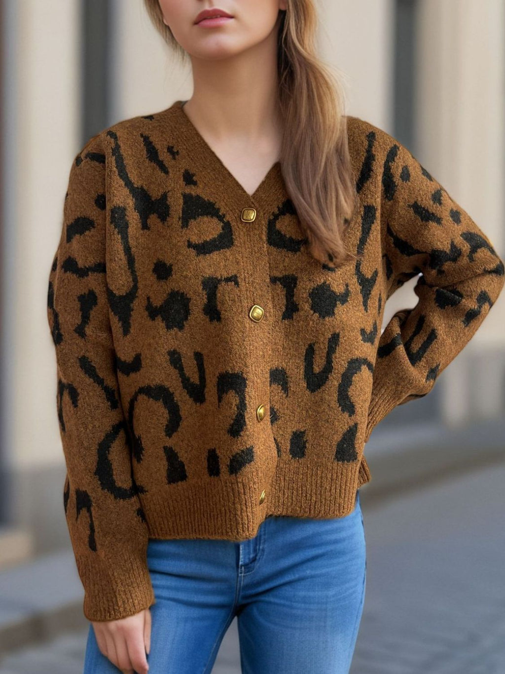 Modern and sleek, the Leopard V-Neck Button Up Cardigan enhances any wardrobe effortlessly.
