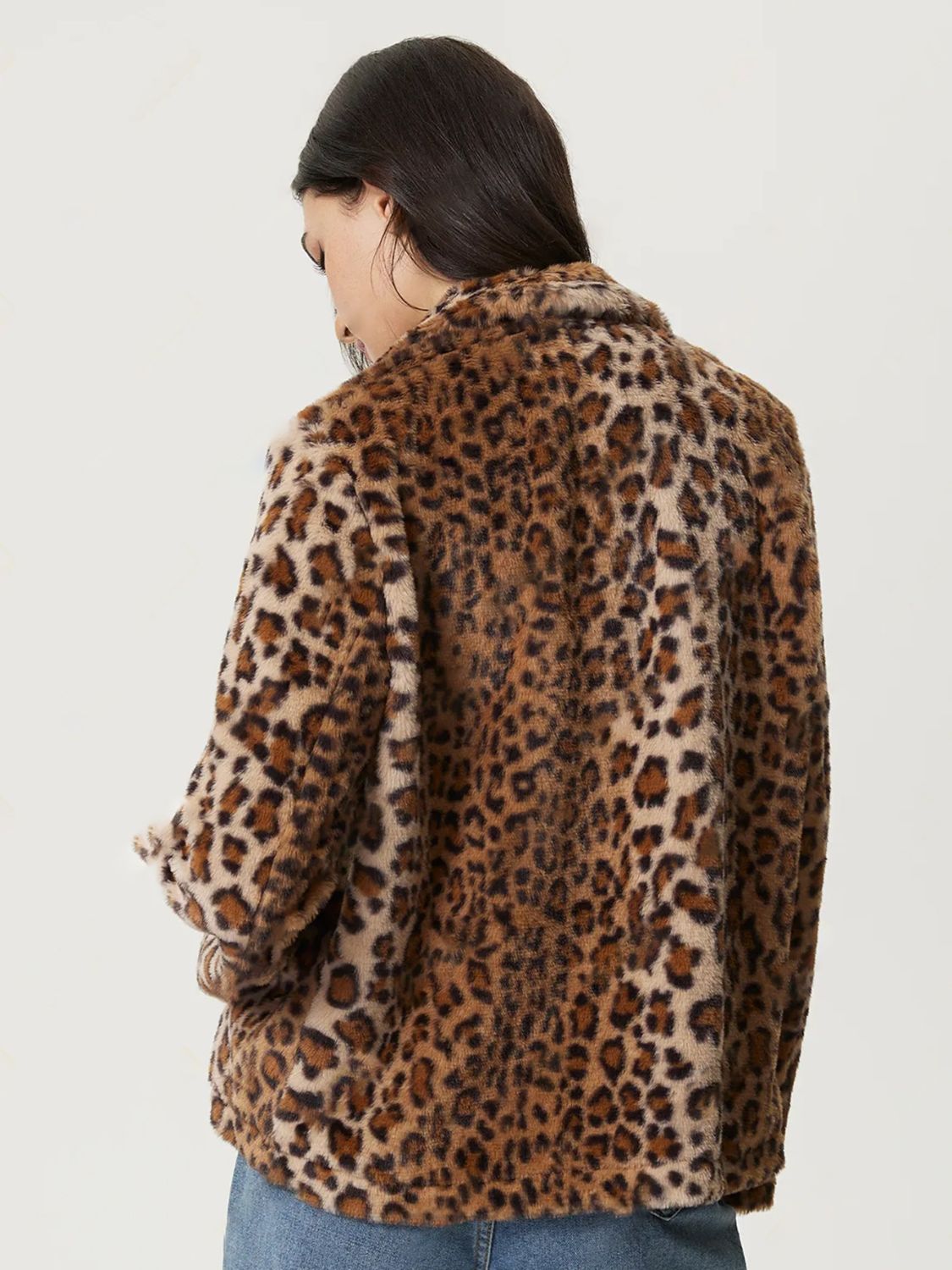 Modern and sleek, the Fuzzy Leopard Collared Neck Jacket enhances any wardrobe effortlessly.