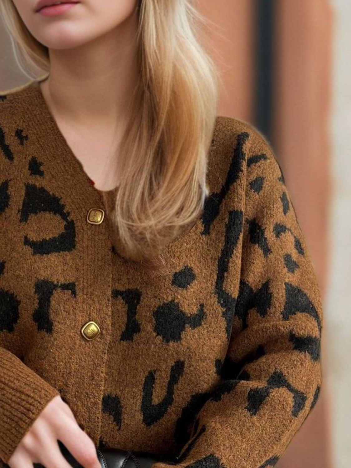 Modern and sleek, the Leopard V-Neck Button Up Cardigan enhances any wardrobe effortlessly.