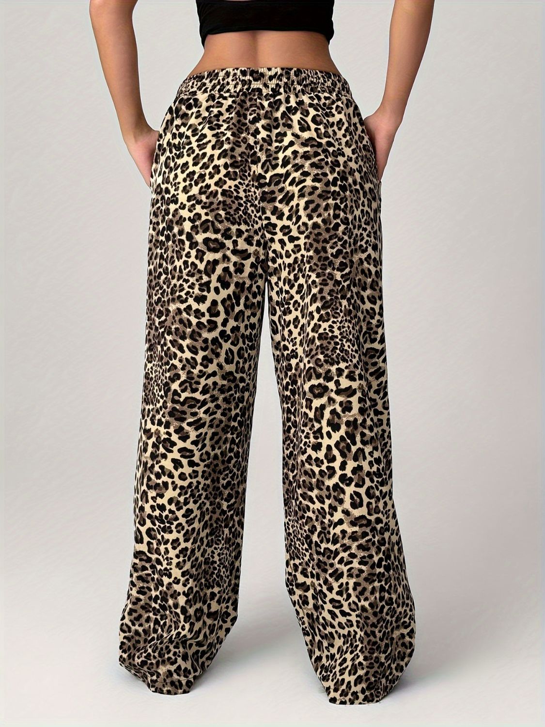 Close-up of Leopard Wide Leg Pants with Pockets, showcasing high-quality fabric and design.