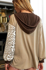 Detailed view of Leopard Drawstring Chest Pocket Hoodie, highlighting its stylish cut and fit.