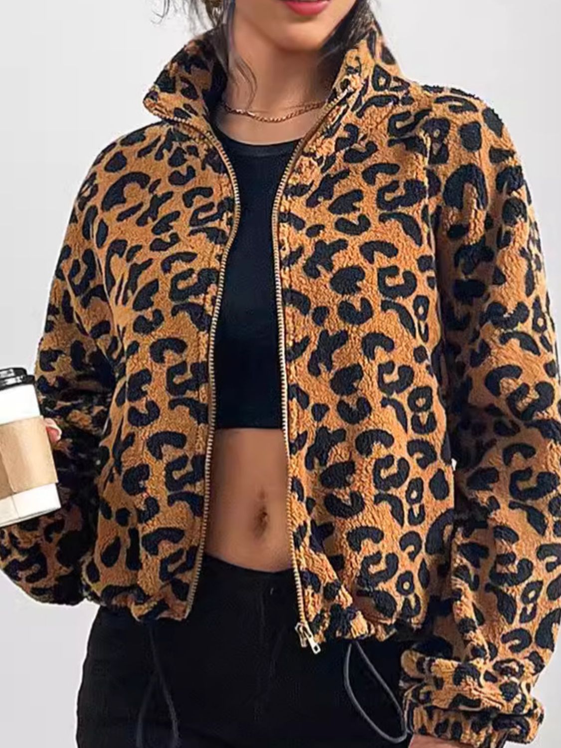 Close-up of Leopard Zip Up Long Sleeve Jacket, showcasing high-quality fabric and design.